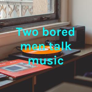 Two bored men talk music