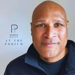 At the Podium with Patrick Huey