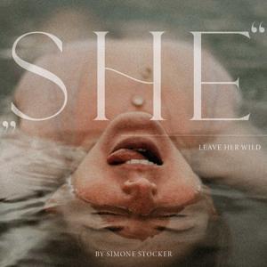 "SHE"