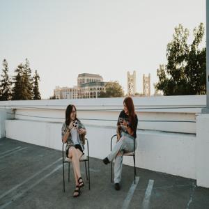 Two Girls One Cup of Coffee