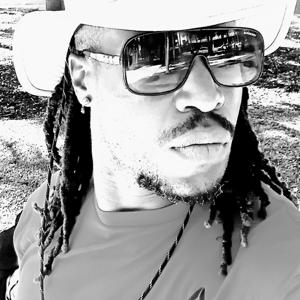 WRITTEN MU'MAN ON THE MIC