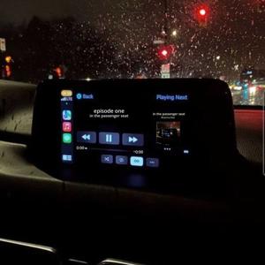 in the passenger seat