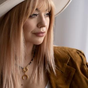 Emigrantka na miotle